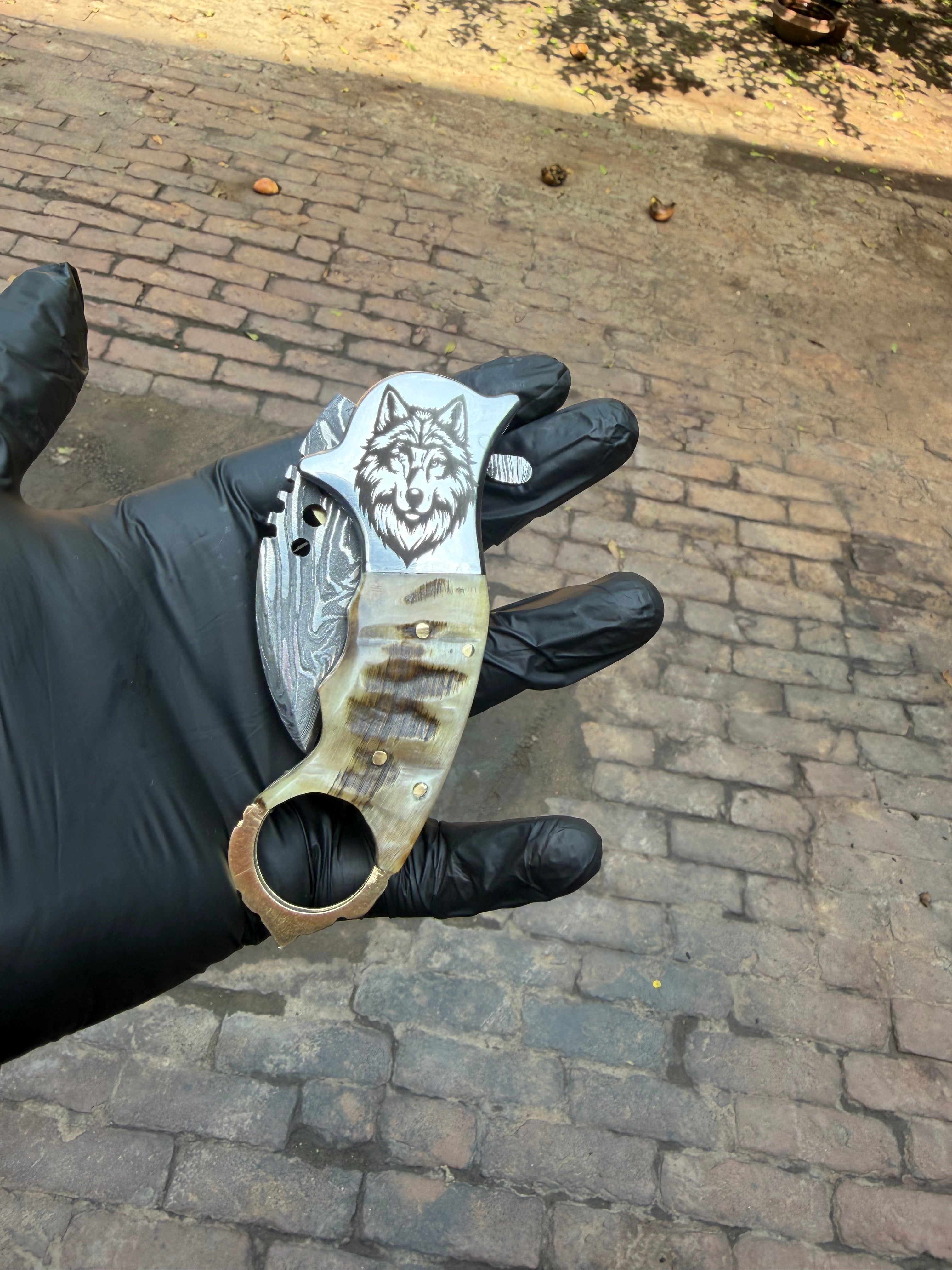 Wolf Claw Damascus Folding Karambit with Engraved Wolf Bolster 