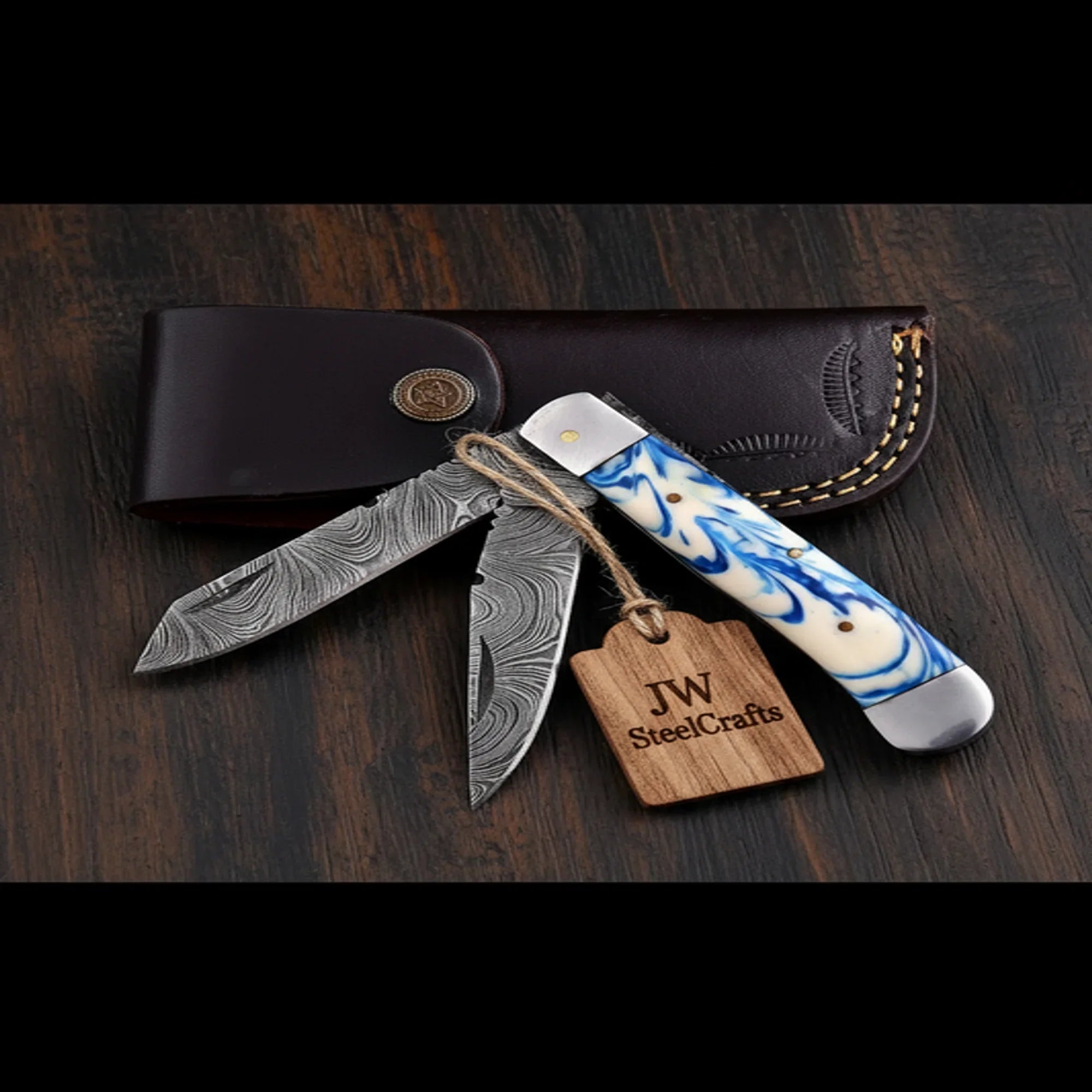 Dual-Blade Folding Trapper Sky Blue Resin Handle Steel Bolster Trapper