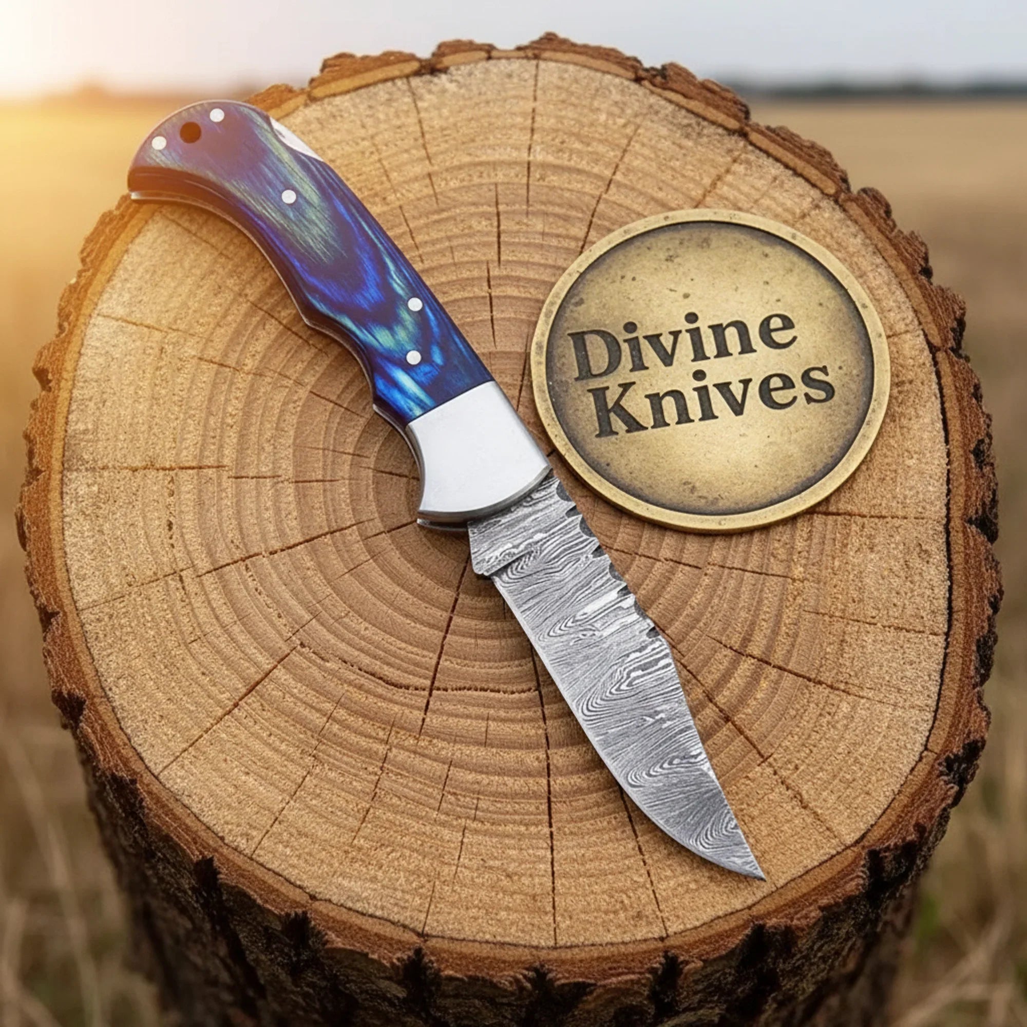 Damascus Drop Point Knife with Blue Pakka Wood Handle and Steel Bolsters