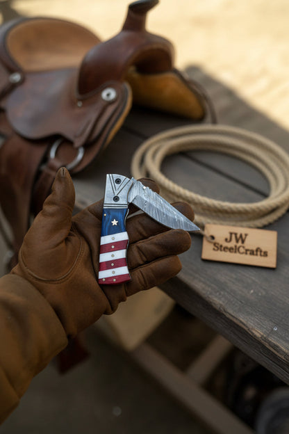 Patriot Damascus Folding Knife 7” opened – American Flag Handle with Leather Sheath
