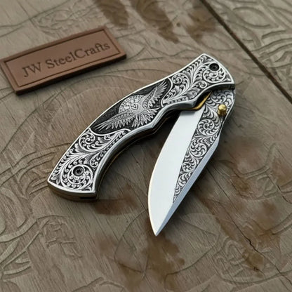 Hand Engraved Folding Knife — Eagle Motif Stainless Steel Scales, Mirror Polish Blade, Liner Lock, Wooden Box &amp; Viking Rune Bracelet