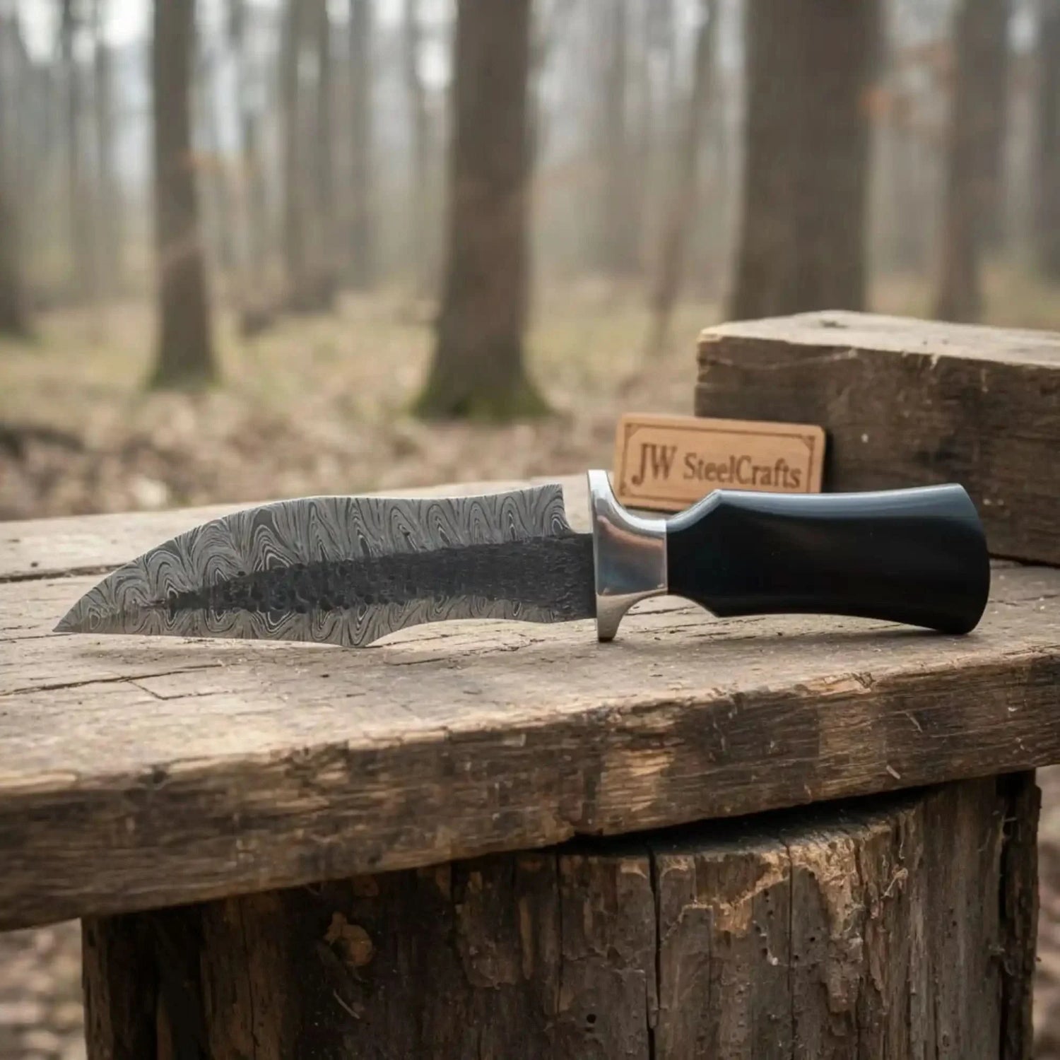 Damascus Trailing Point Fixed Blade Hunting Knife — Forged Ladder Pattern Blade, Black Resin Handle &amp; Steel Guard