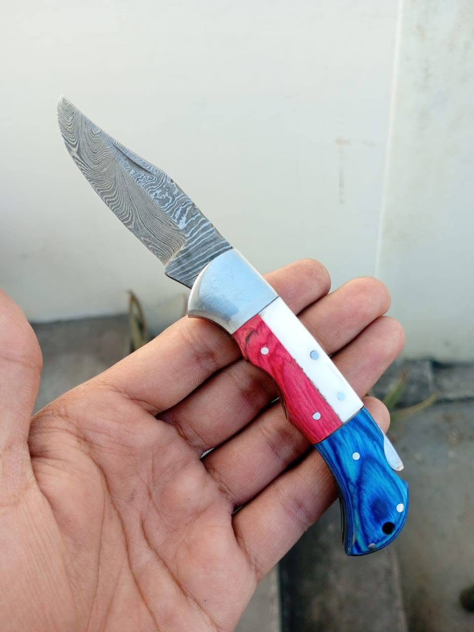 Americana Folding Pocket Knife with Patterned Steel Blade