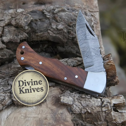 Damascus Clip Point Pocket Knife with Rosewood Handle and Steel Bolster