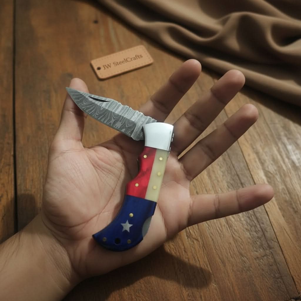 Handmade Damascus Folding Knife – Tricolor Resin Handle (Red, White &amp; Blue) with Leather Sheath